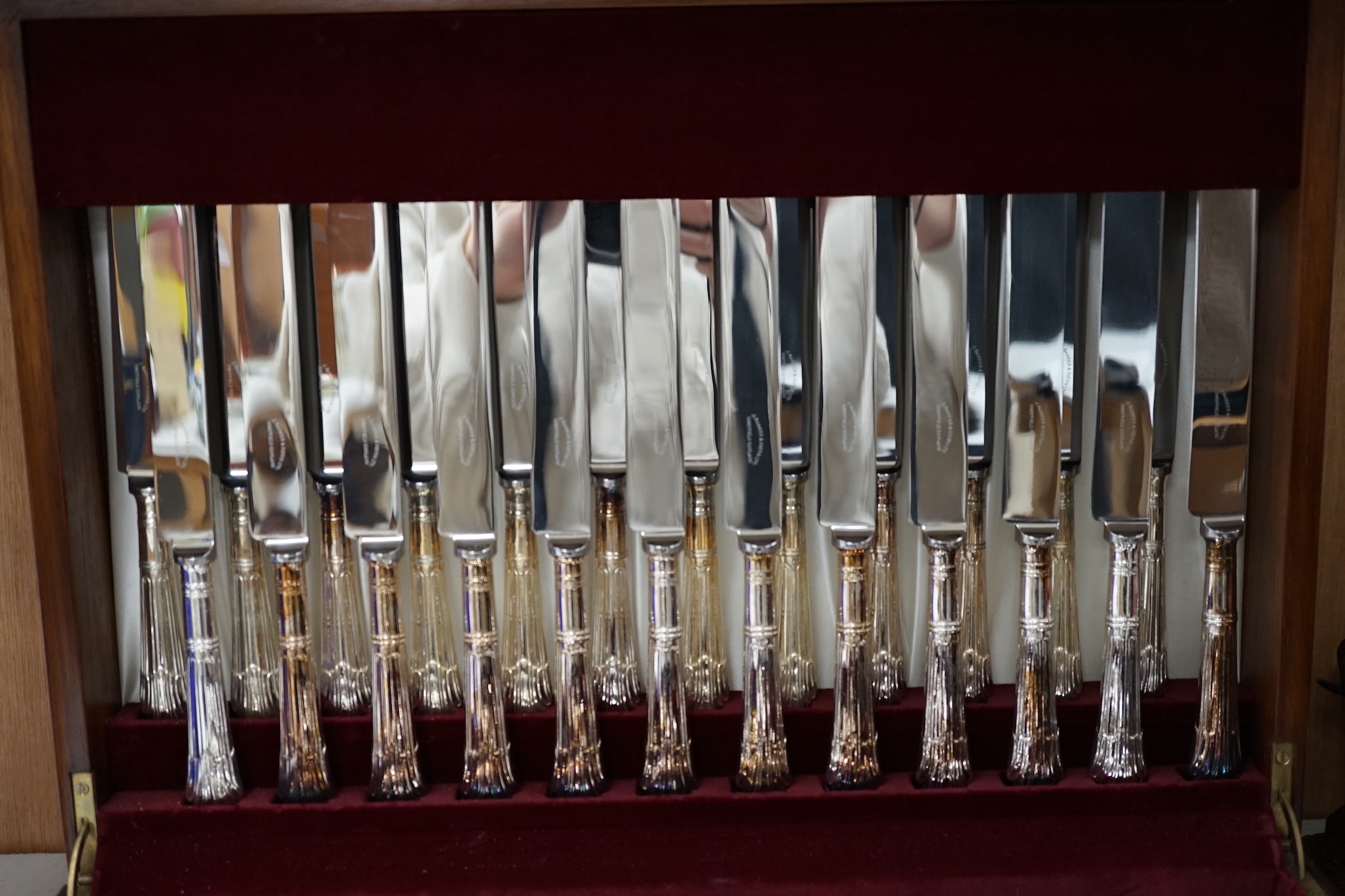 A canteen of silver plated cutlery, 47cm wide